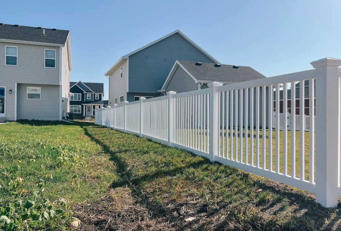 Beautiful white picket fence in residential Gary, IN home